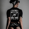 Tattoos, pretty eyes and thick thighs T-shirt